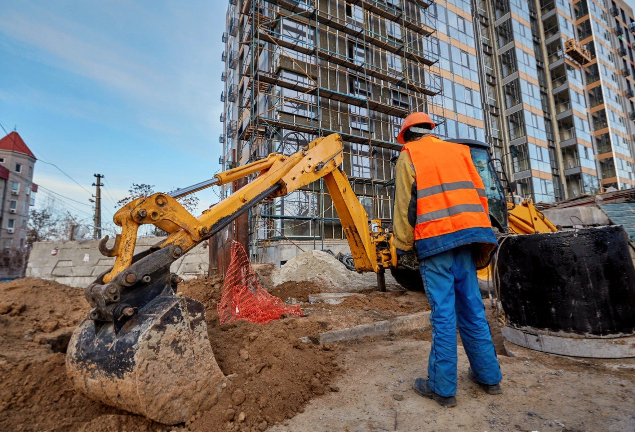 Excavation Pro LA excavator preparing a construction site foundation with precision digging